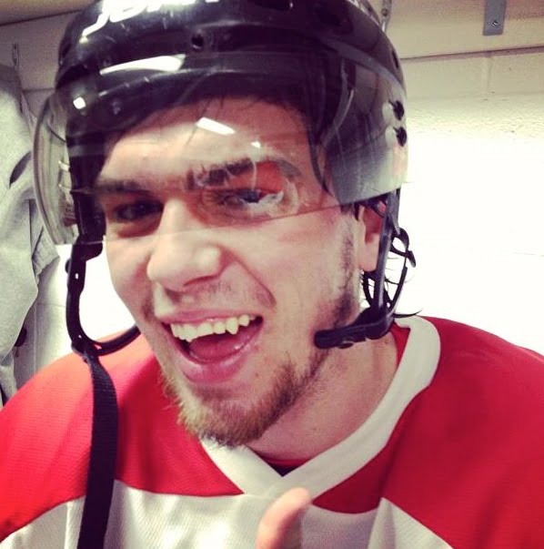 man with broken teeth after hockey accident